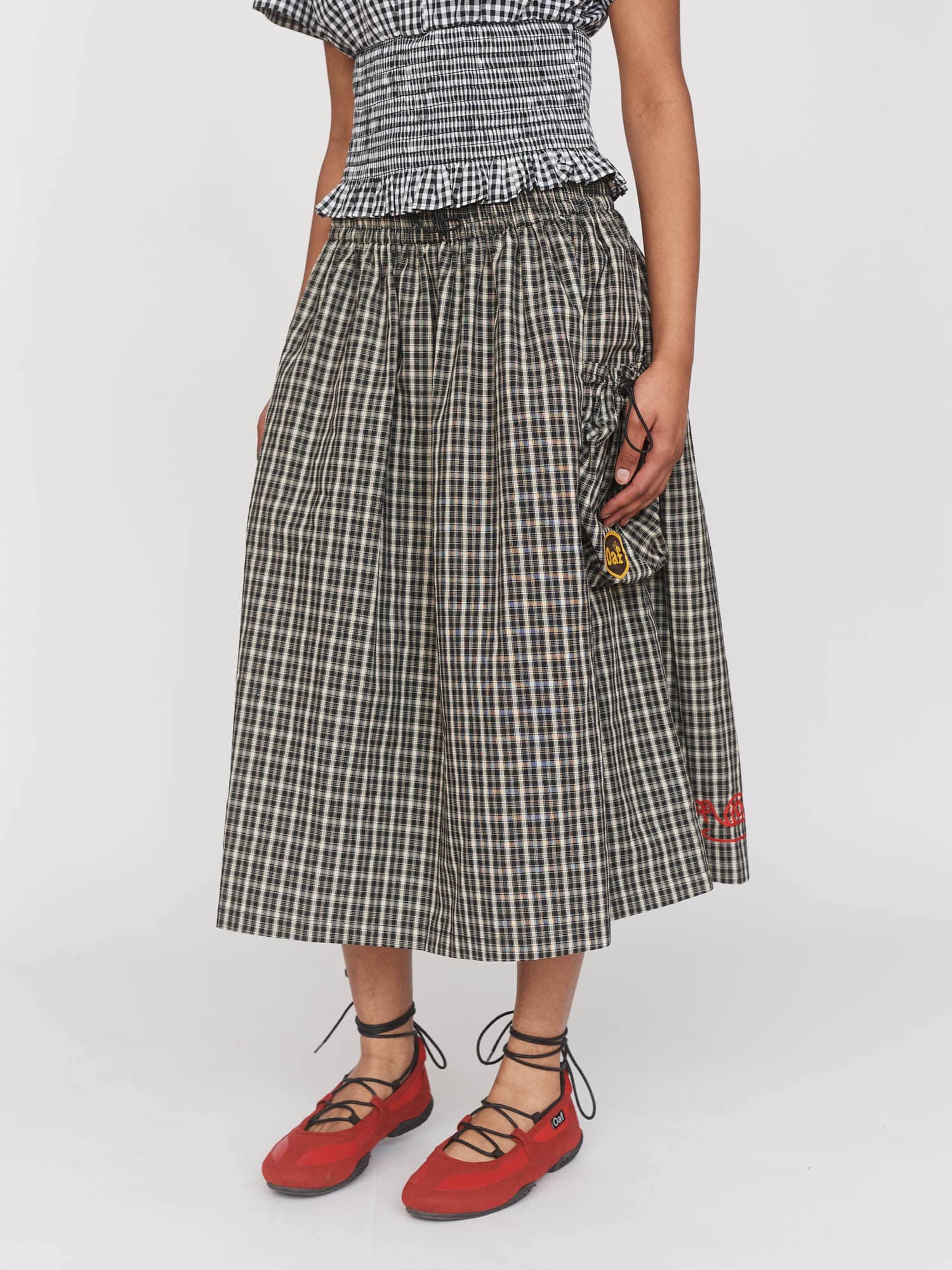 Checked Out Black Skirt